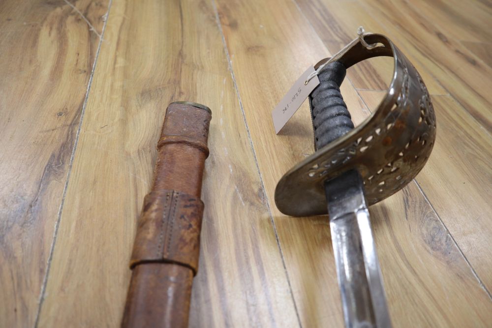 An Edward VII Infantry Officers sword, shagreen grip and 91cm etched, single edged blade, leather scabbard
